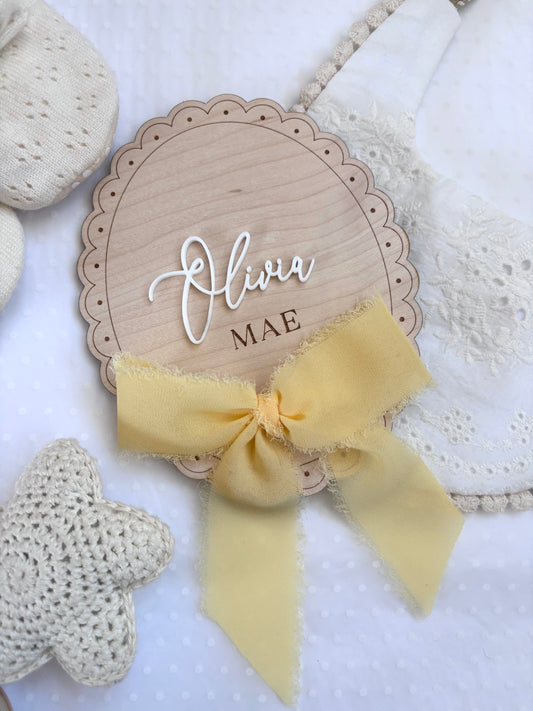 Personalised Baby Name Reveal Wooden Scallop Bow Plaque